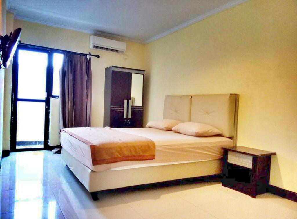 Quint Hotel Manado Exterior foto