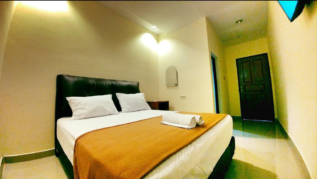 Quint Hotel Manado Exterior foto
